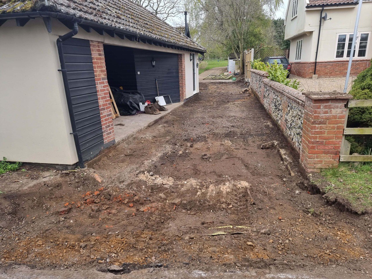 This is a tarmac driveway that is in the process of being dug out and installed by March Driveways